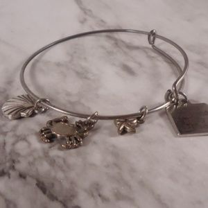 Silver tone beach themed charm bracelet